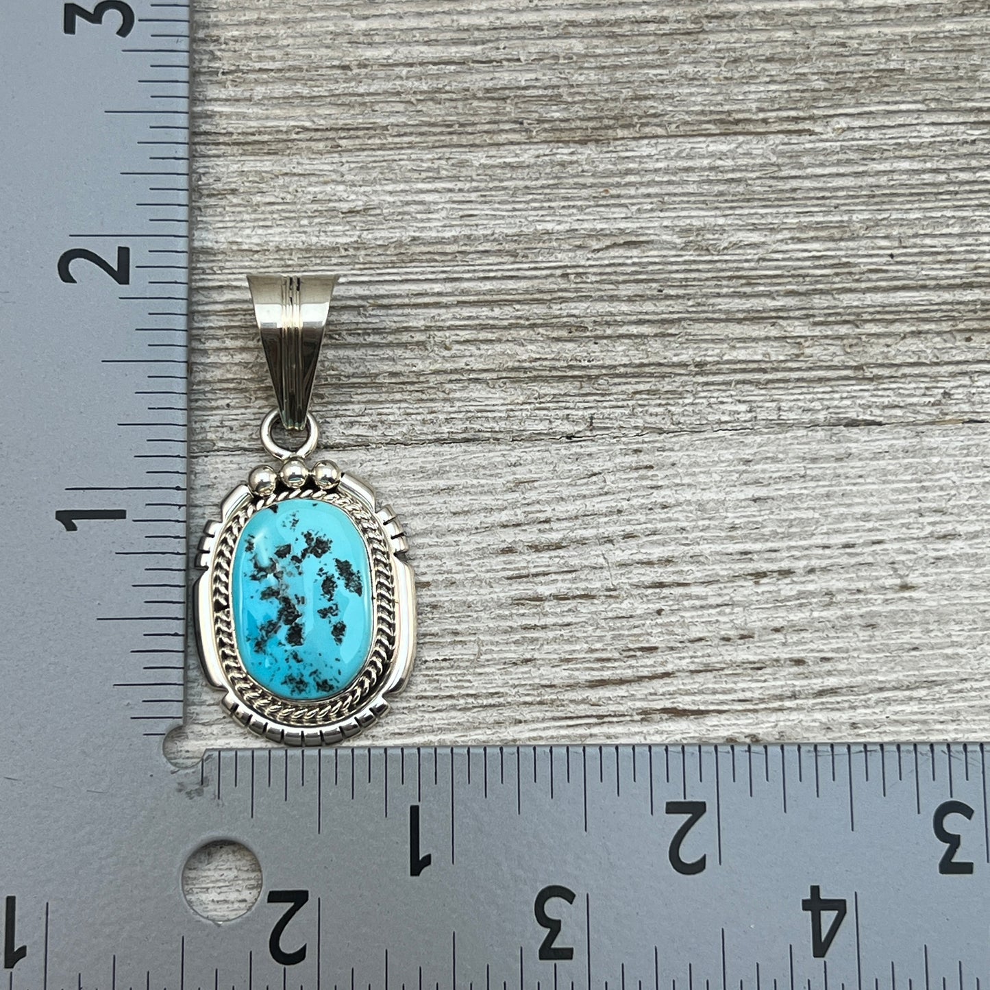 Sleeping Beauty Turquoise Pendant Navajo Samuel Yellowhair sterling silver