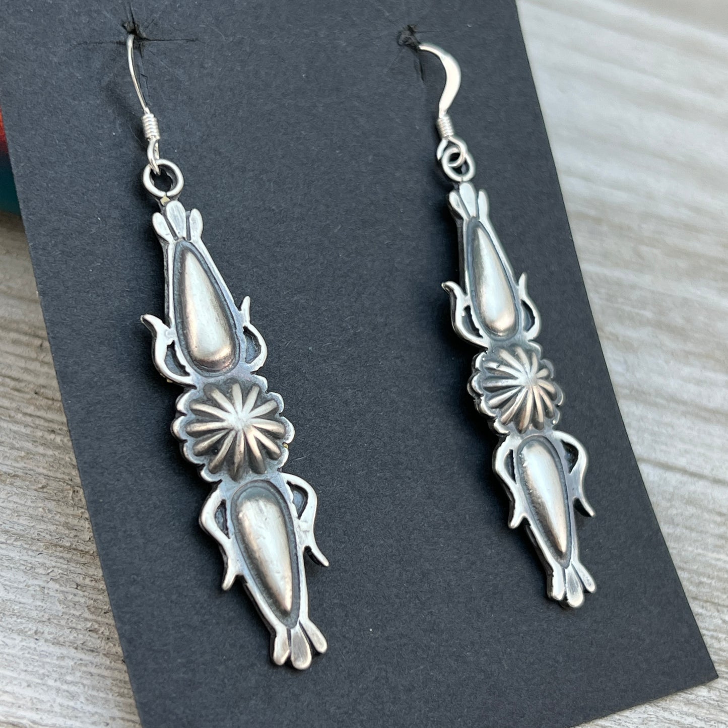 Stamped Concho Button Repouse dangle earrings sterling silver Navajo Bobby Platero