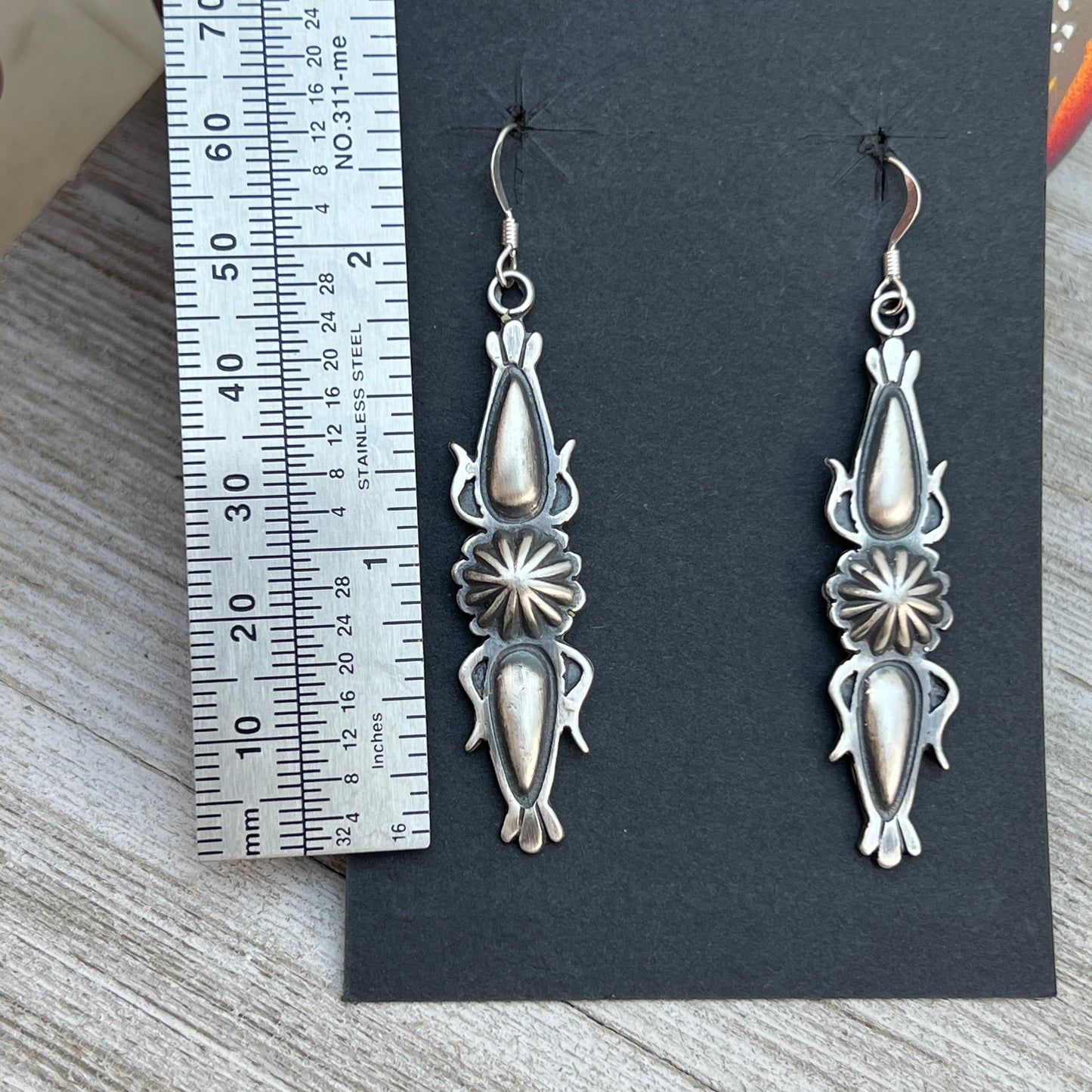 Stamped Concho Button Repouse dangle earrings sterling silver Navajo Bobby Platero