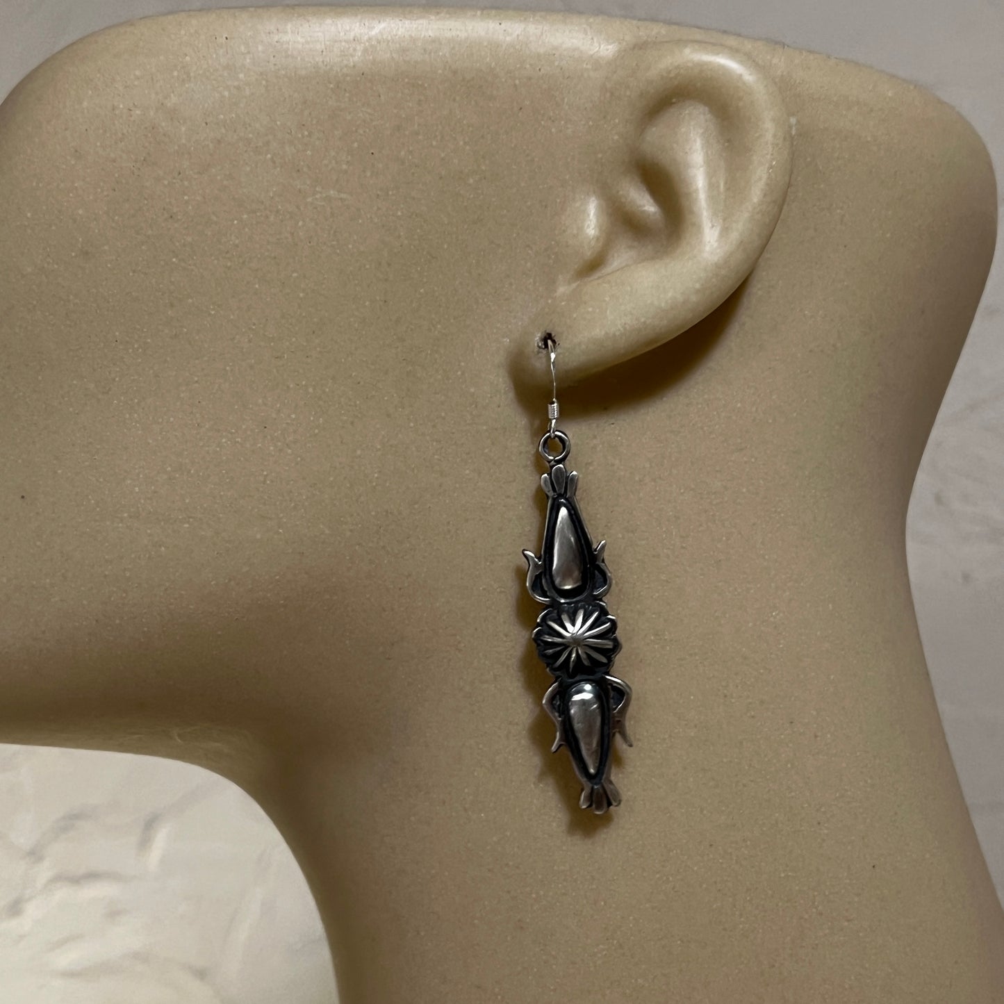 Stamped Concho Button Repouse dangle earrings sterling silver Navajo Bobby Platero