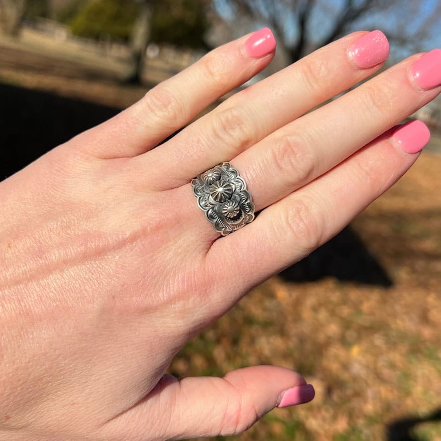 Sterling Silver Stamped Ring, small concho buttons, band by Navajo artist, BENNY RAMONE