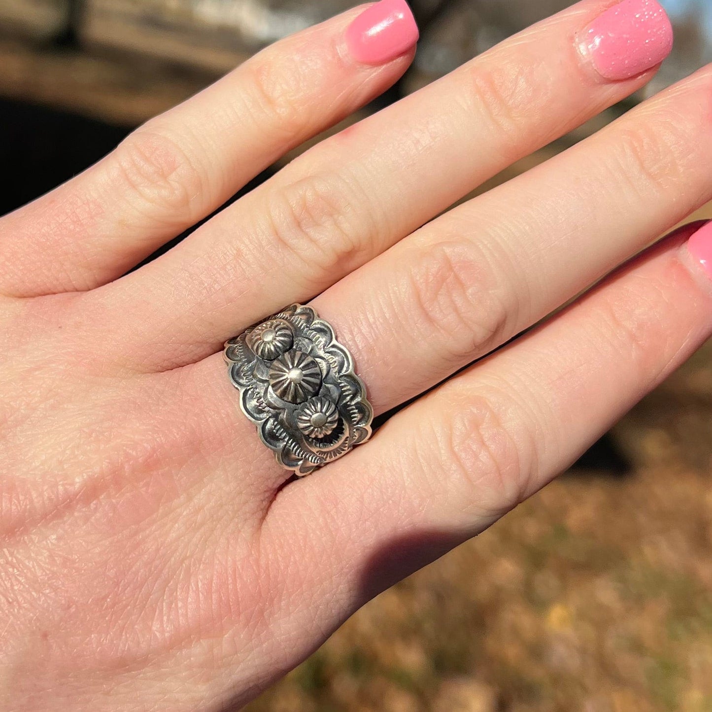 Sterling Silver Stamped Ring, small concho buttons, band by Navajo artist, BENNY RAMONE