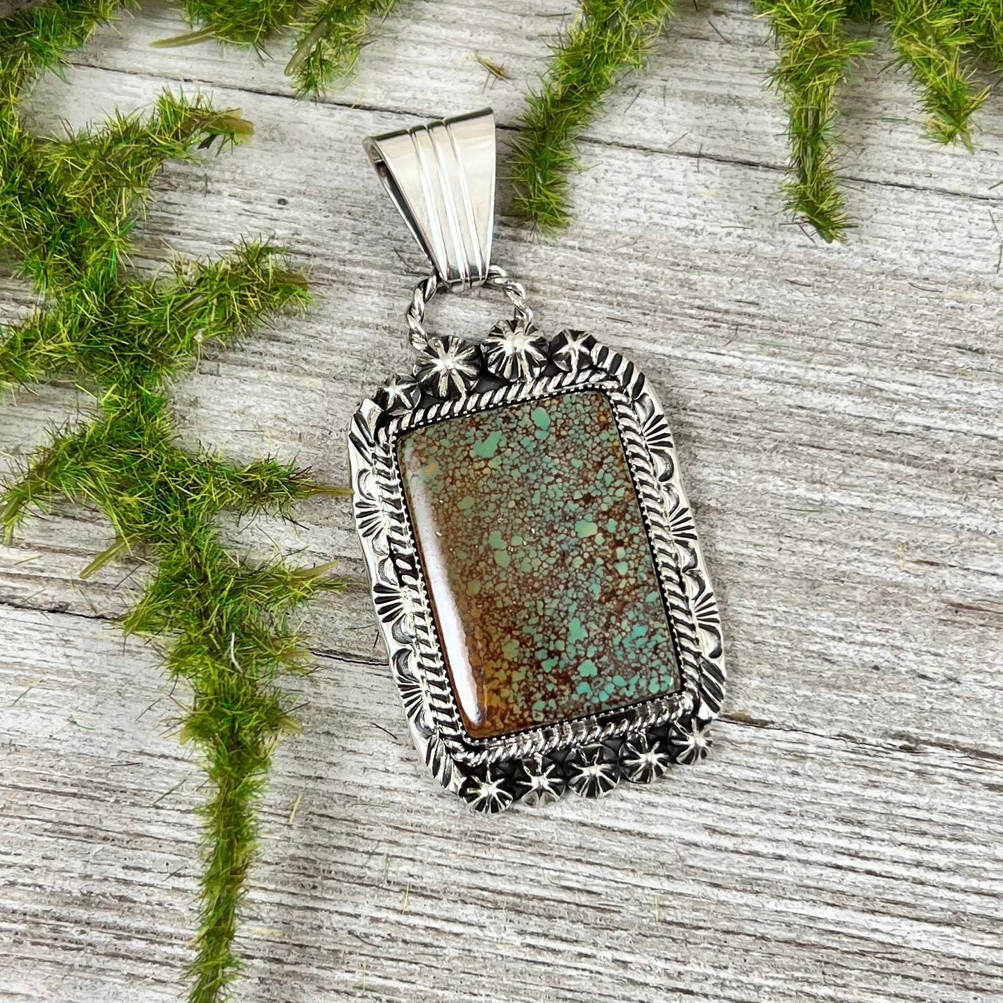 Nevada Spiderweb Turquoise Pendant by Navajo artist Rita Long sterling silver