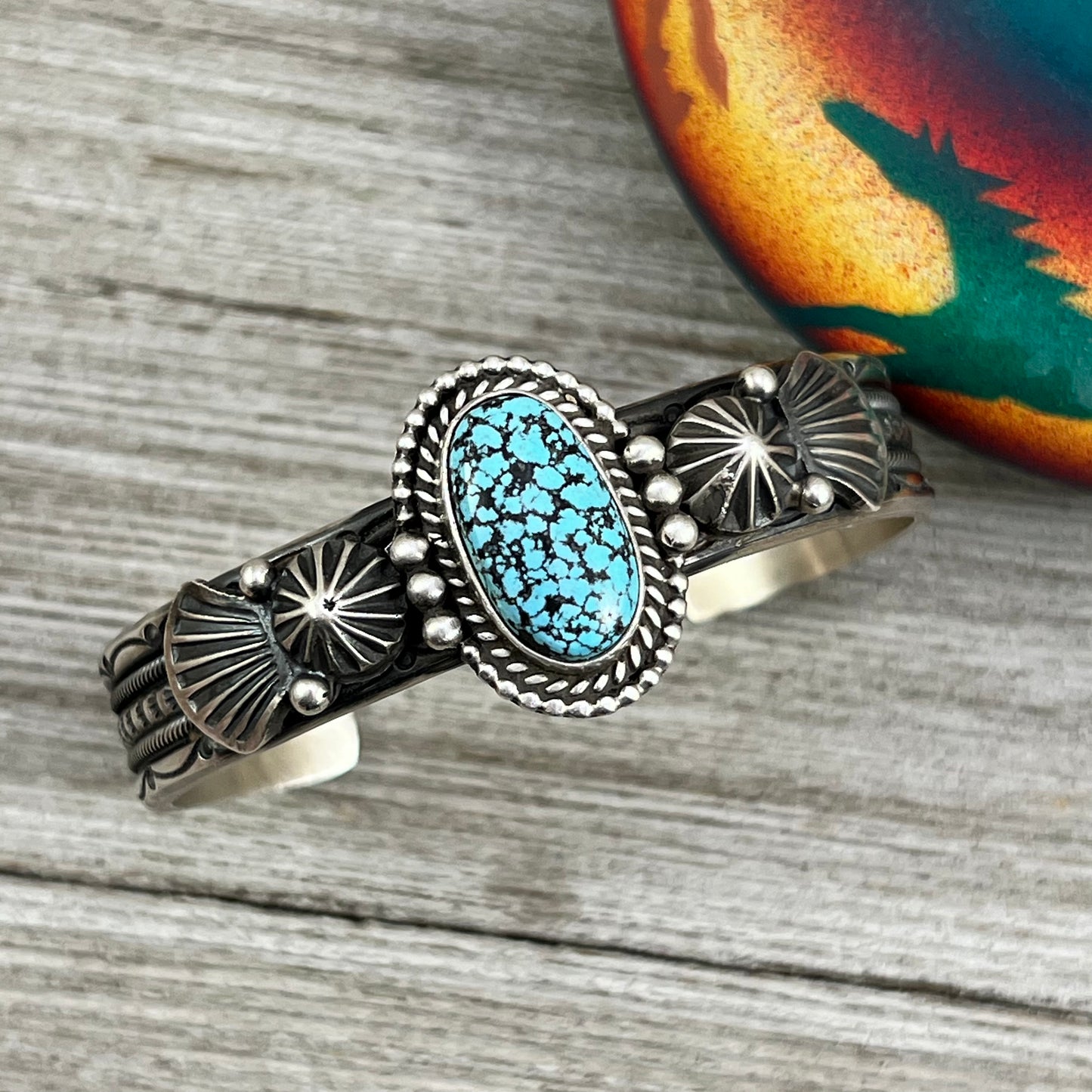 6 5/8" , Kingman spiderweb, Black Web turquoise, Stamped cuff bracelet, Navajo handmade signed, Michael Calladitto sterling silver