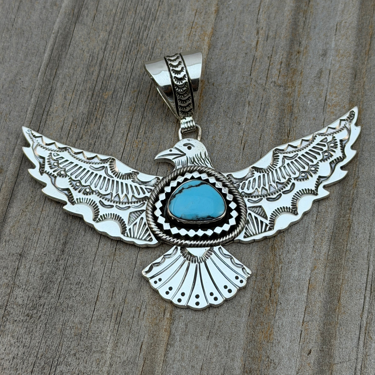 Turquoise Thunderbird Pendant hand stamped Jeremy Delgarito Navajo PD10