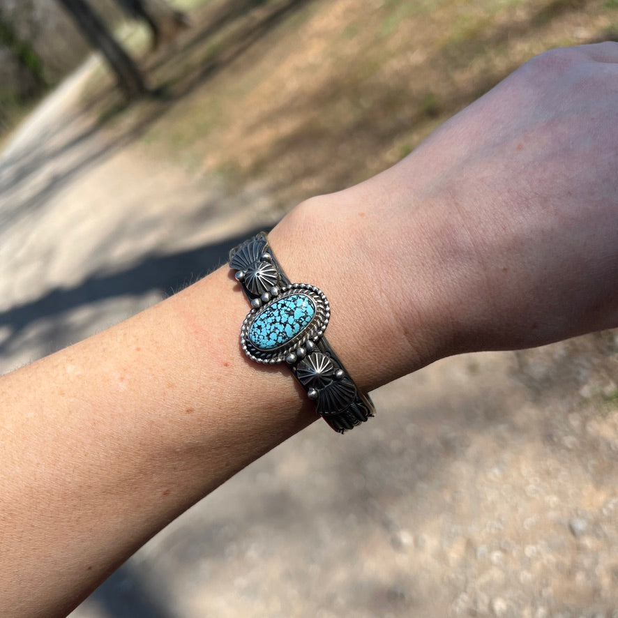 6 5/8" , Kingman spiderweb, Black Web turquoise, Stamped cuff bracelet, Navajo handmade signed, Michael Calladitto sterling silver